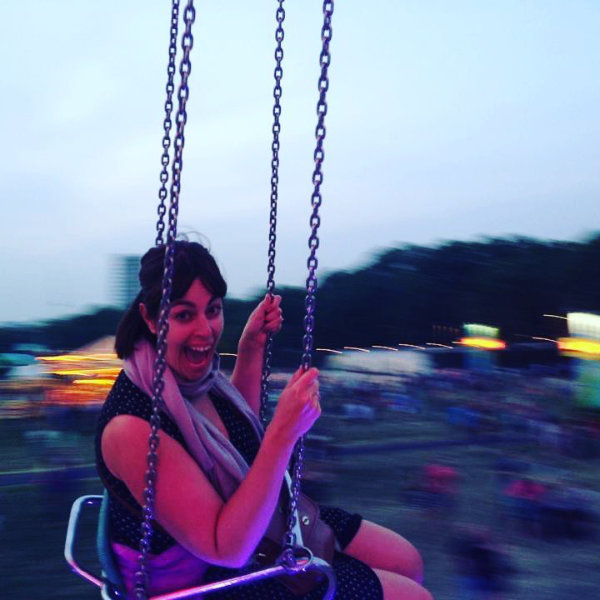 Jeni Carroll laughing on a fairground ride