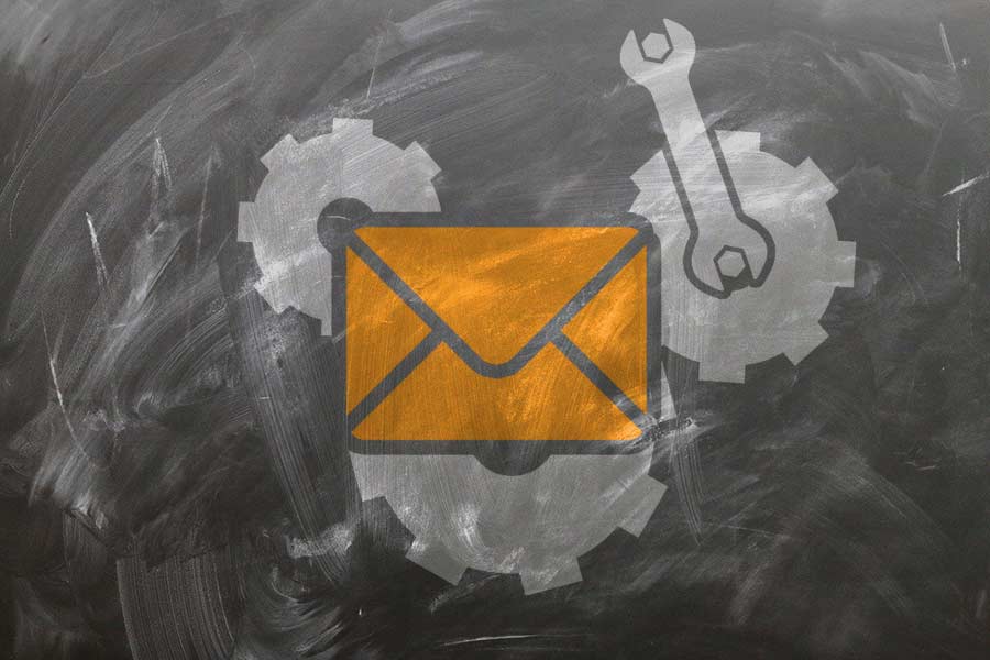Illustration of an envelope with cogs being fine-tuned by a wrench
