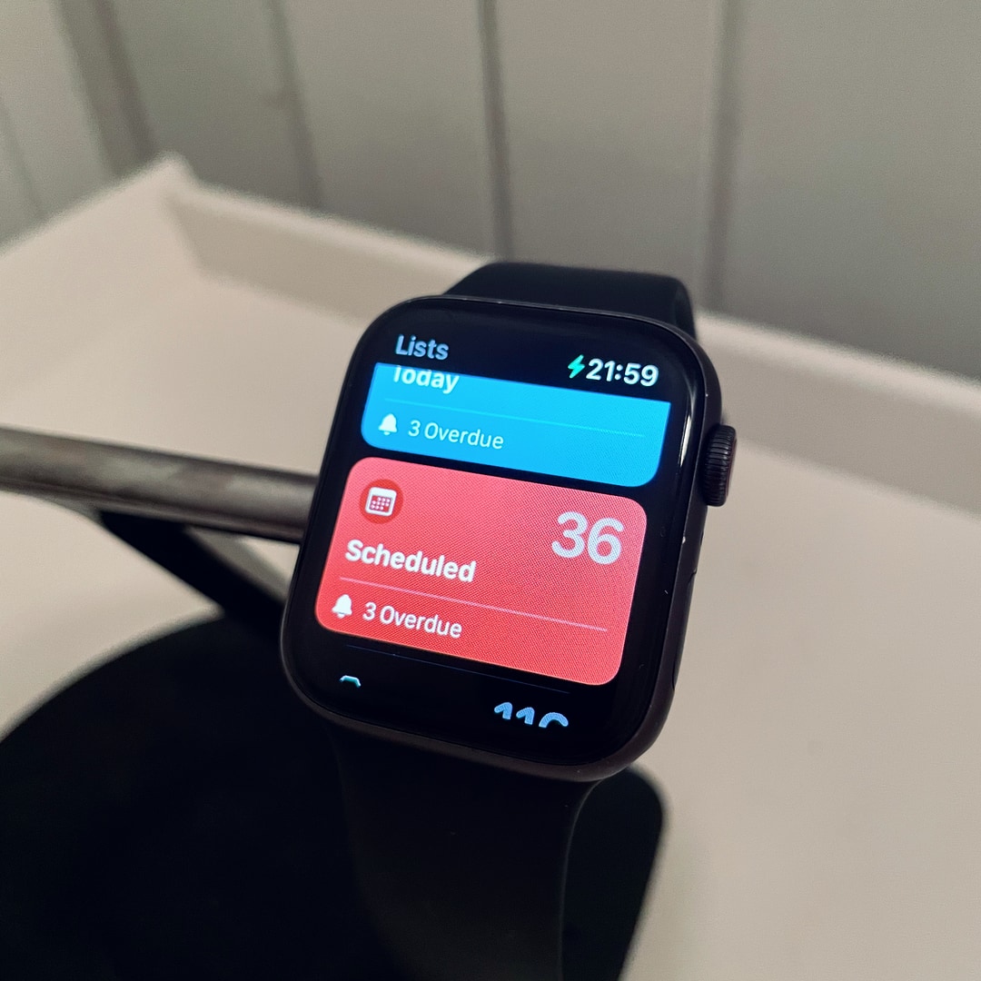 Smartwatch with a to-do list app showing. It says scheduled 36, 3 overdue.