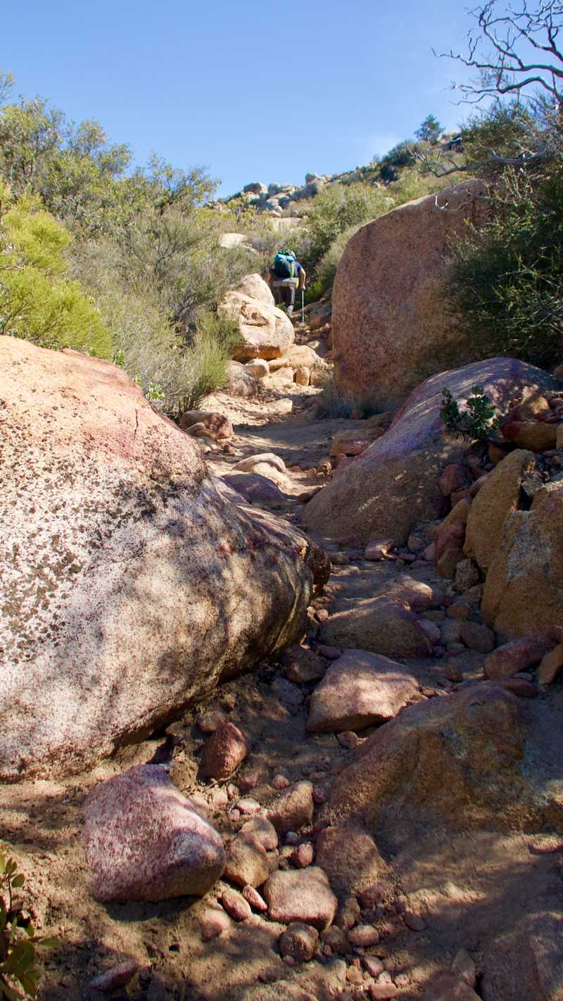 The trail makes a rocky climb