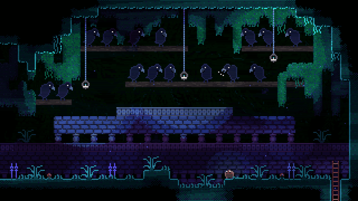 Screenshot from Animal Well of a room with many rows of crows perched high above the player.