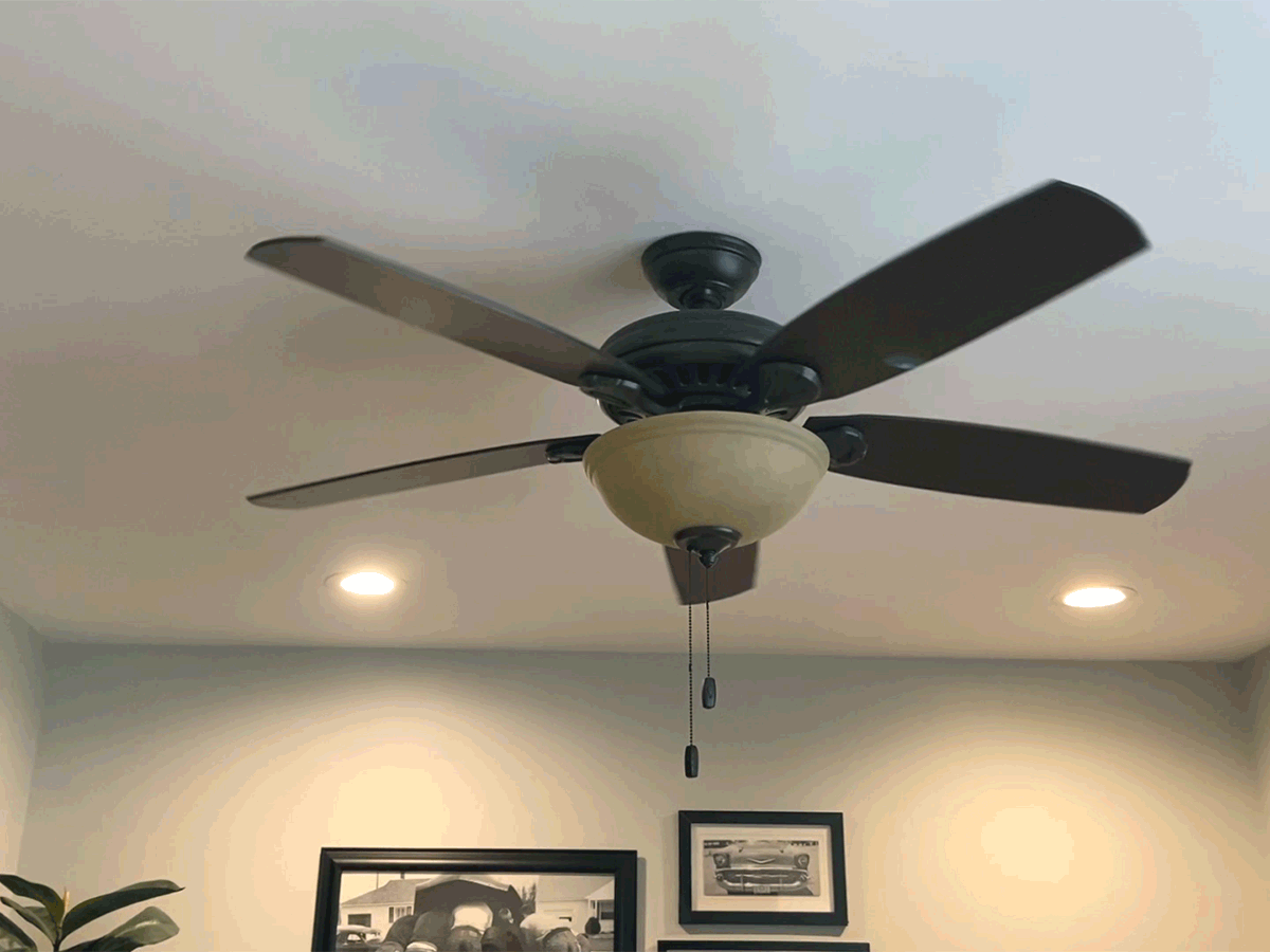 Brown hunter ceiling fan mounted to ceiling