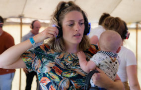 Lingfest 2019 silent disco mum dancing with toddler in arms ©Brett Butler