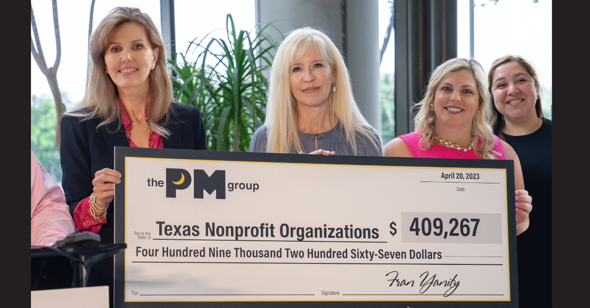 The PM Group presents a check of over $409,000 to local nonprofits from 2023 annual fundraiser