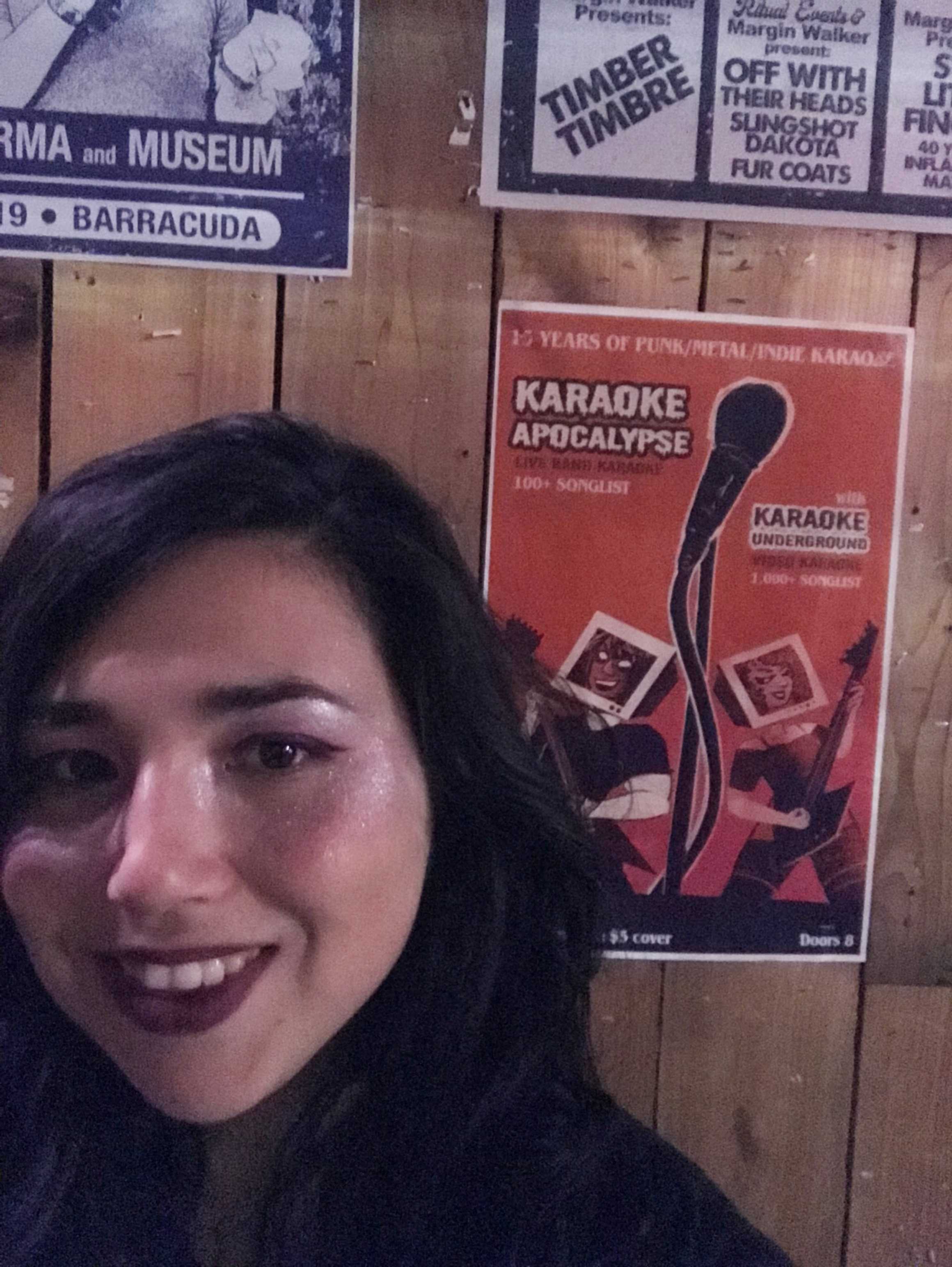 Me with my poster art design for the final Karaoke Apocalypse show in the wild