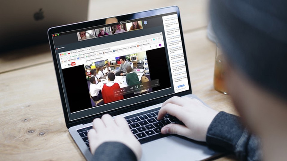 People in a online call watching a video about teaching children