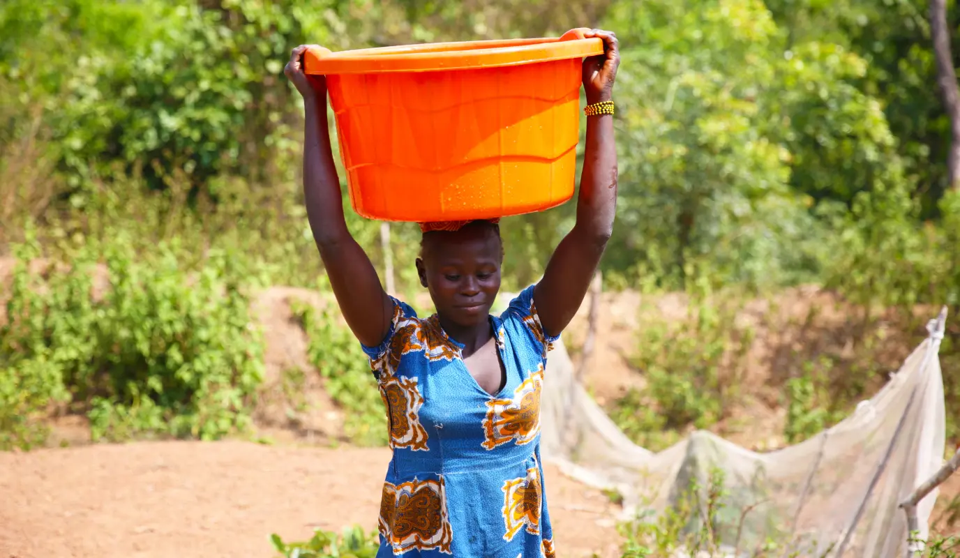 A woman carries water from a Concern-constructed water point at Boyali in Central African Republic.