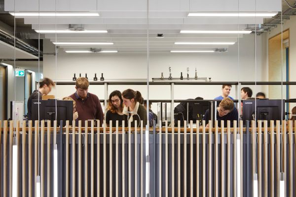 Hawkins Brown-University of Manchester Schuster Annexe-interior view-students collaborating in a lab