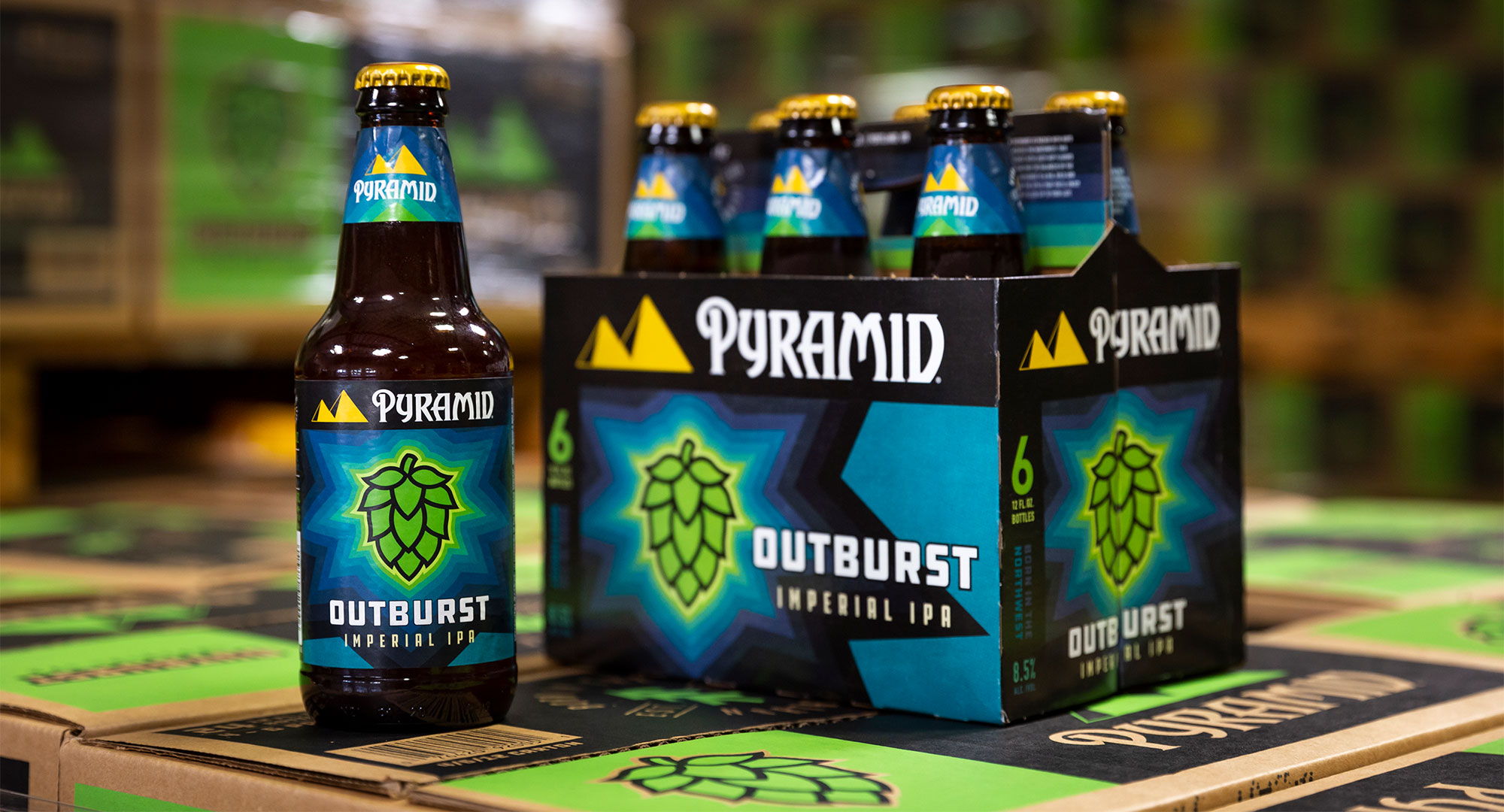 Outburst 6-pack and bottle on Pyramid boxes