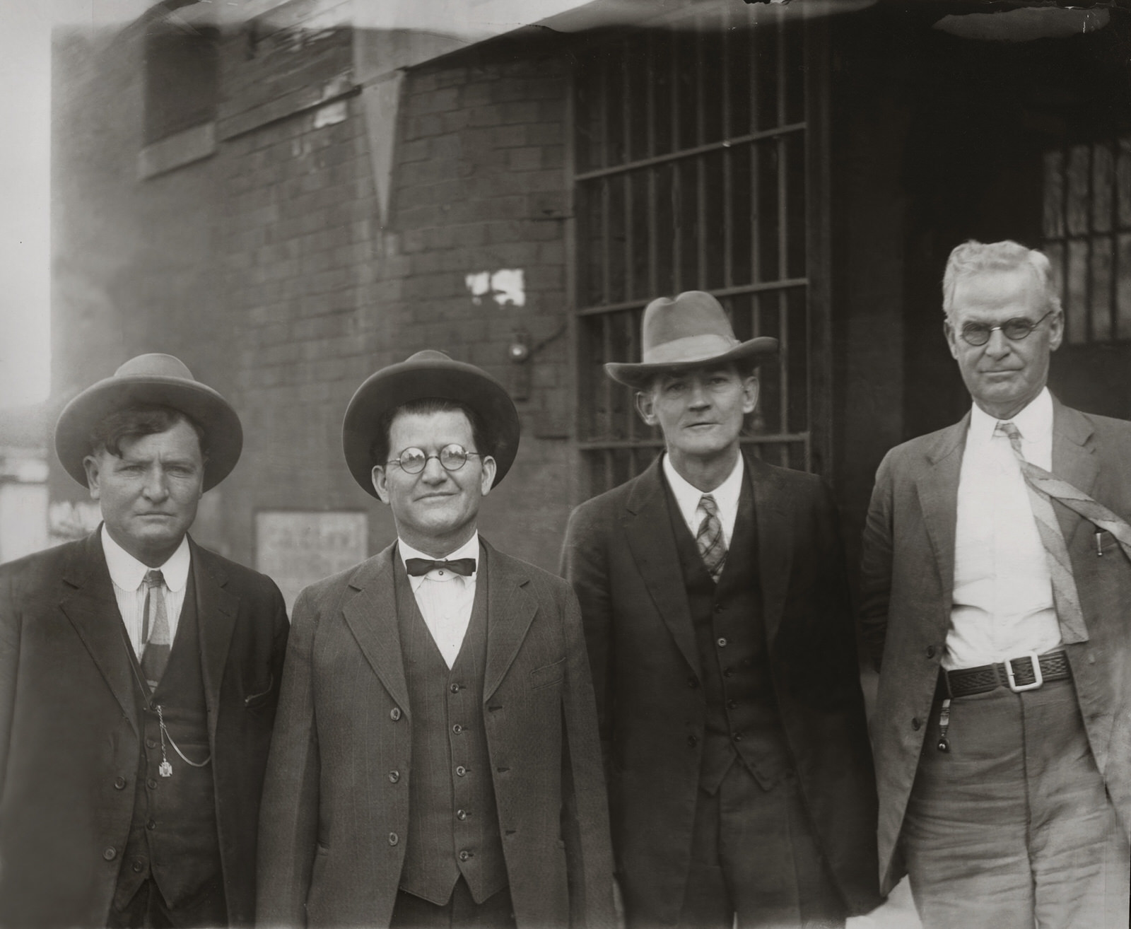 Hale (second from left) and Ramsey (third from left) with U.S. marshals.