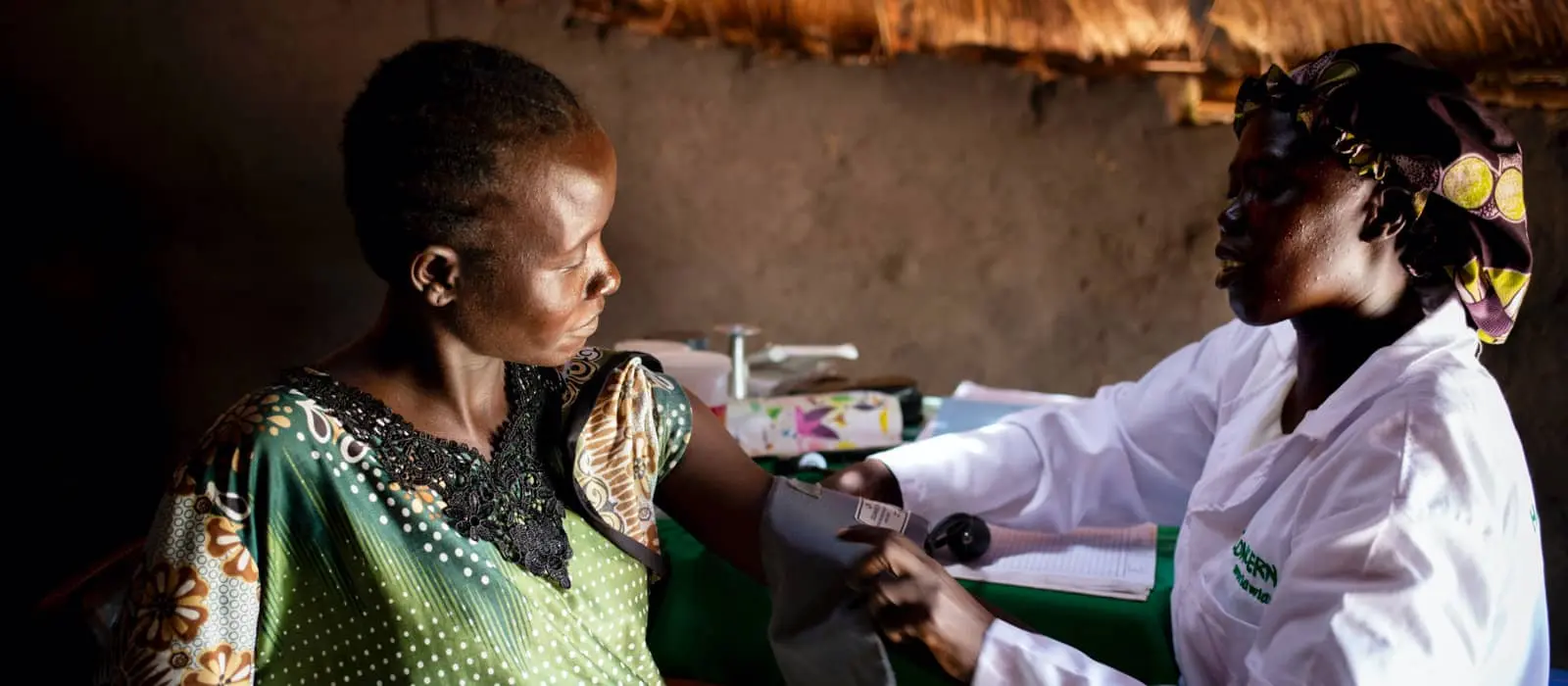 Pregnant Arek Mabior, 28 is seen by Concern midwife Rebekka at a Mobile Health Clinic in Mayomkuol, a remote rural area of Aweil, South Sudan.
