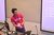 A picture of me, Oisín Quinn, speaking at a
tech conference.
