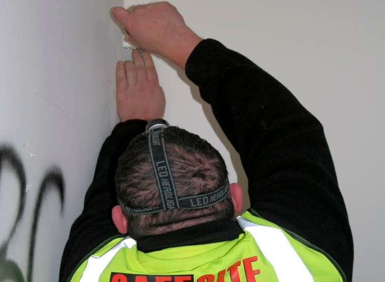 Construction site alarm fitting