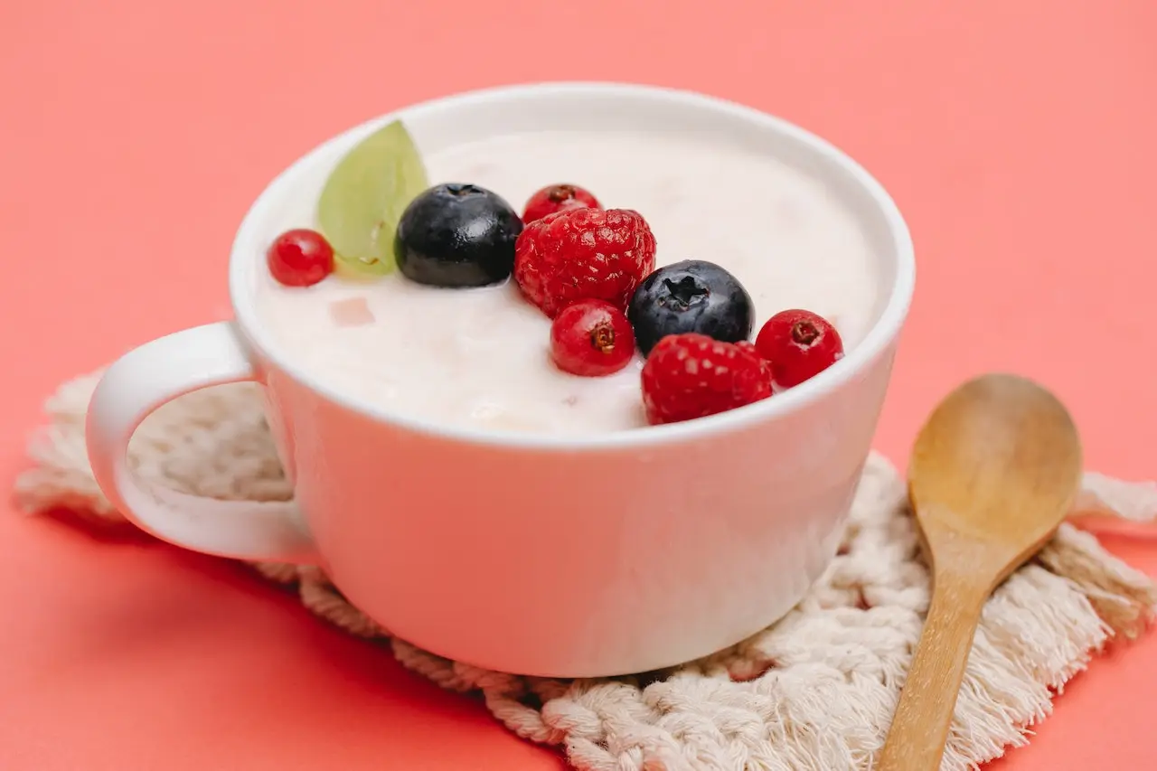 yogurt with berries on coaster