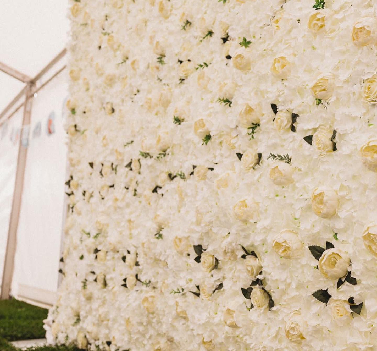 flower wall at wedding reception