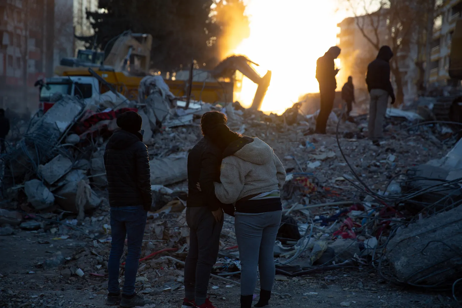 People wait in hope as buildings are excavated after the 2023 Turkey earthquake