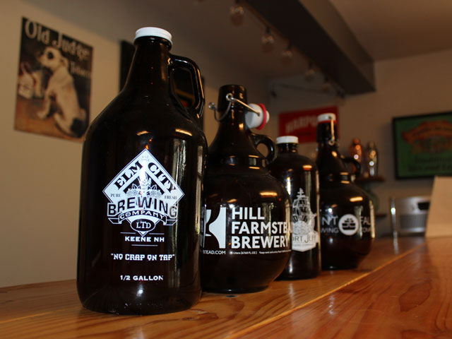 A lineup of growlers from breweries in Connecticut, New Hampshire, New York and Vermont