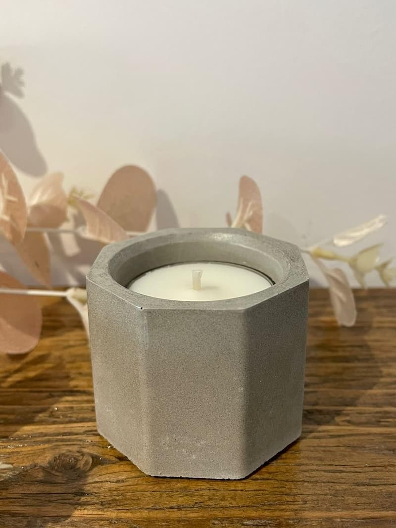 A beautiful little concrete pot, suitable for use as a tealight holder.
