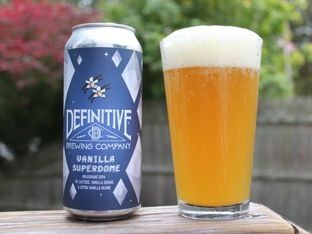 A 16oz can of Vanilla Superdome poured into a pint glass