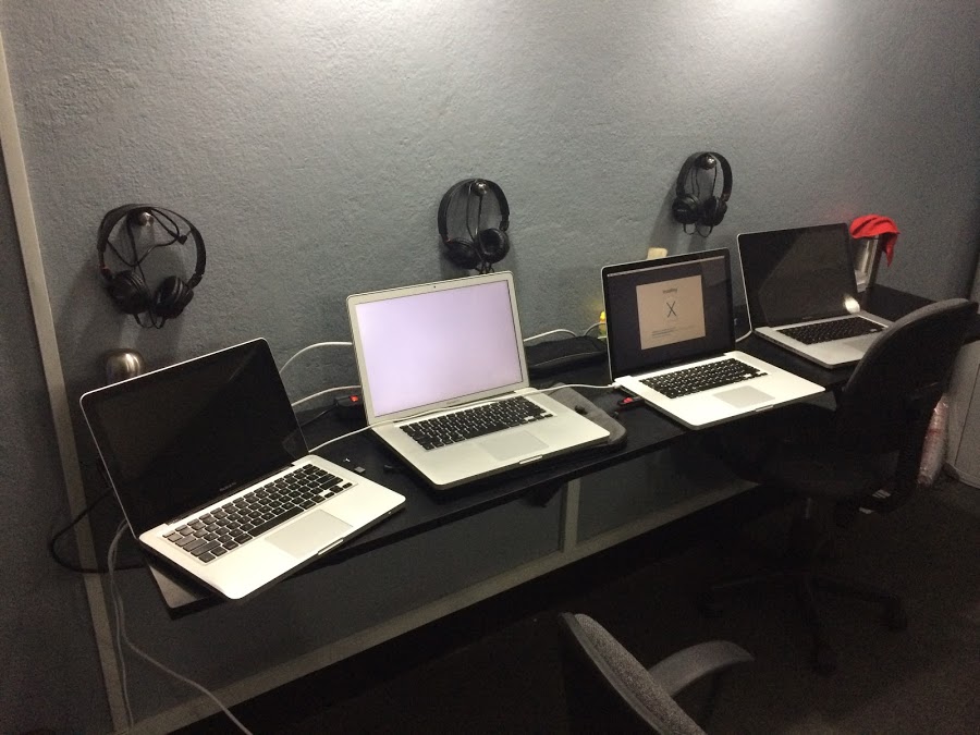 Hesap (left) at the office next to it's minions (other MacBooks).