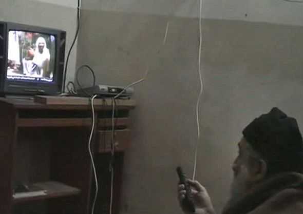 Frail old man watching himself on TV Osama bin Laden watching himself on TV