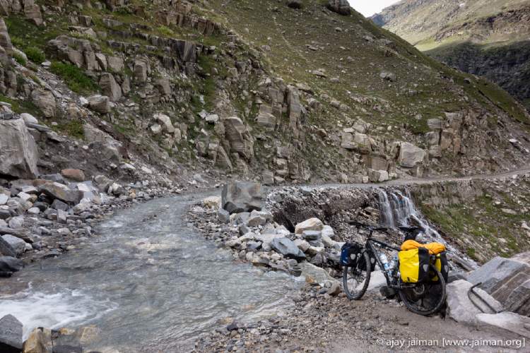 Ready to ride through a stream flowing on the road. Dry bags
