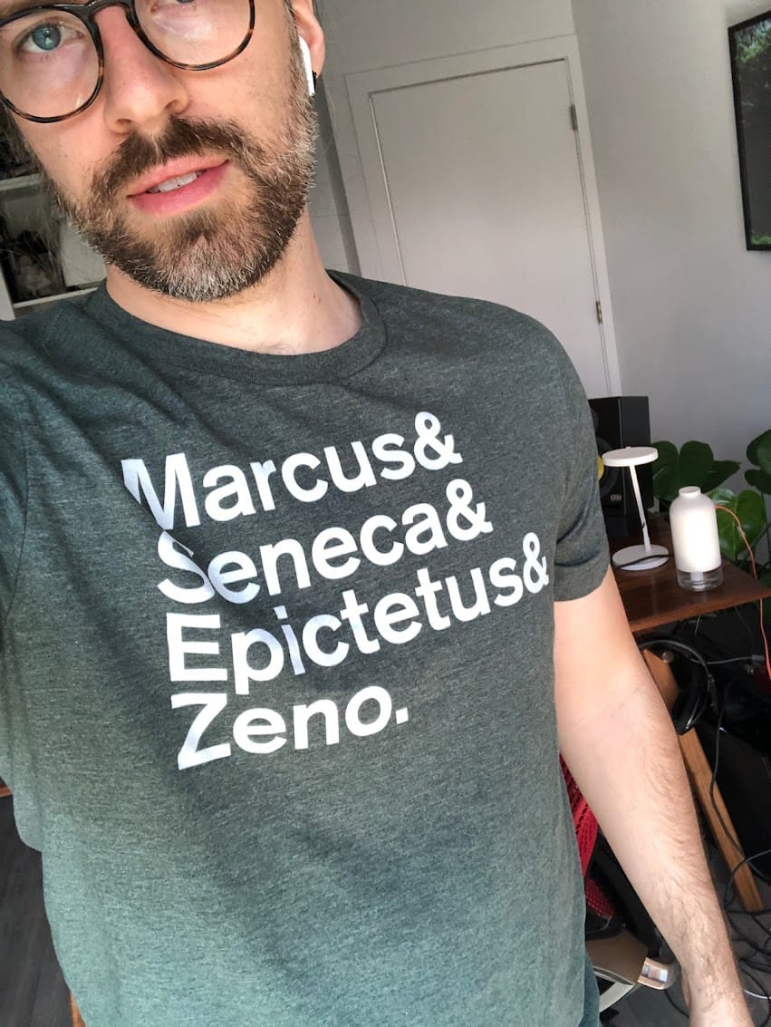 man wearing shirt with stoic philosopher names
