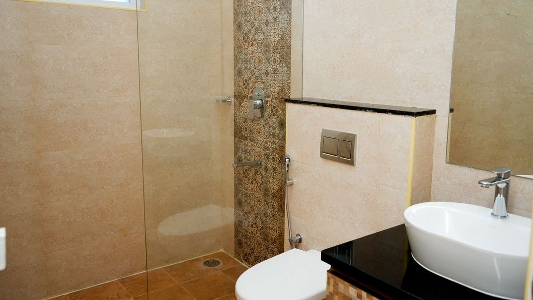 Bathroom with glass partition