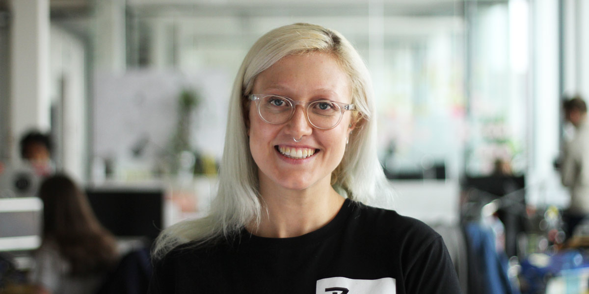 Georgina Macneil, Head of Student Success at CareerFoundry Georgina Macneil, Head of Student Success at CareerFoundry, smiling at the camera