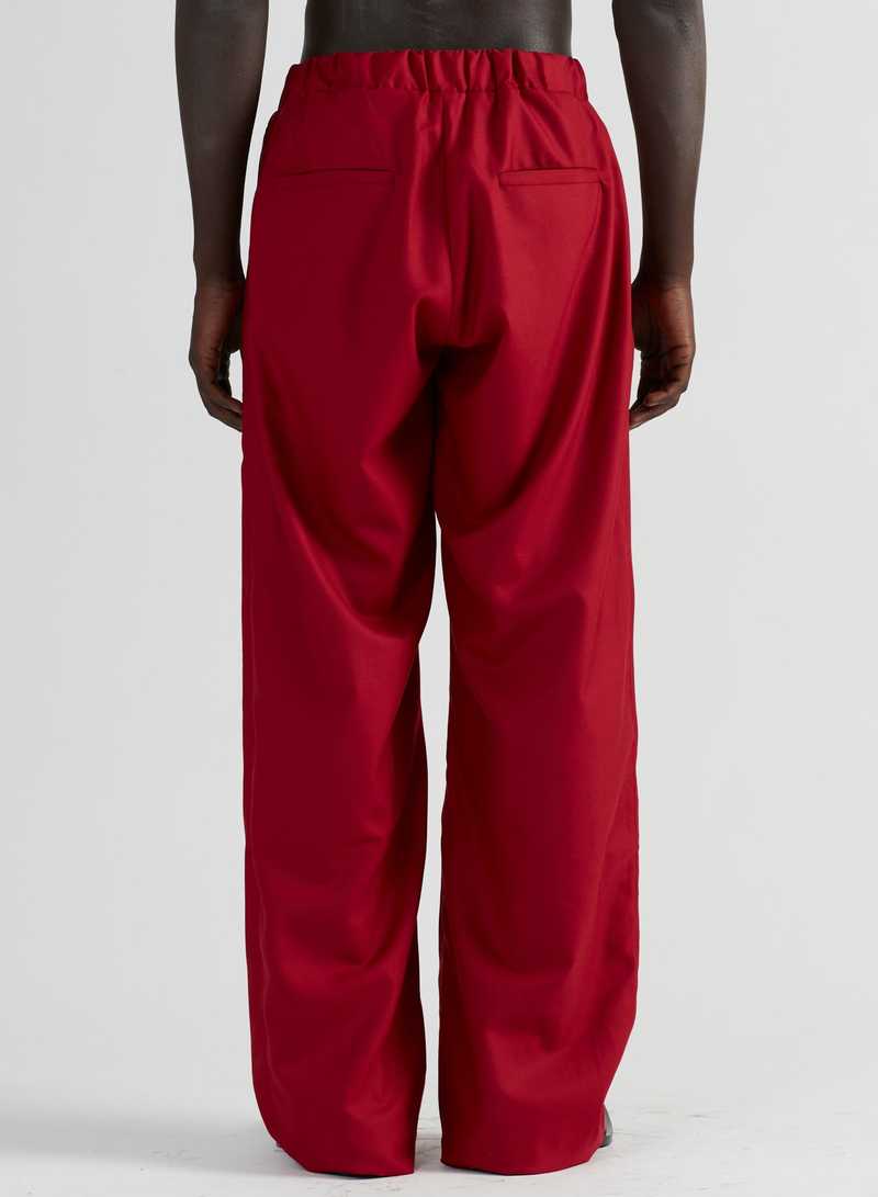 Sigrid Tailored Trousers Red, back view. GmbH AW22 collection.