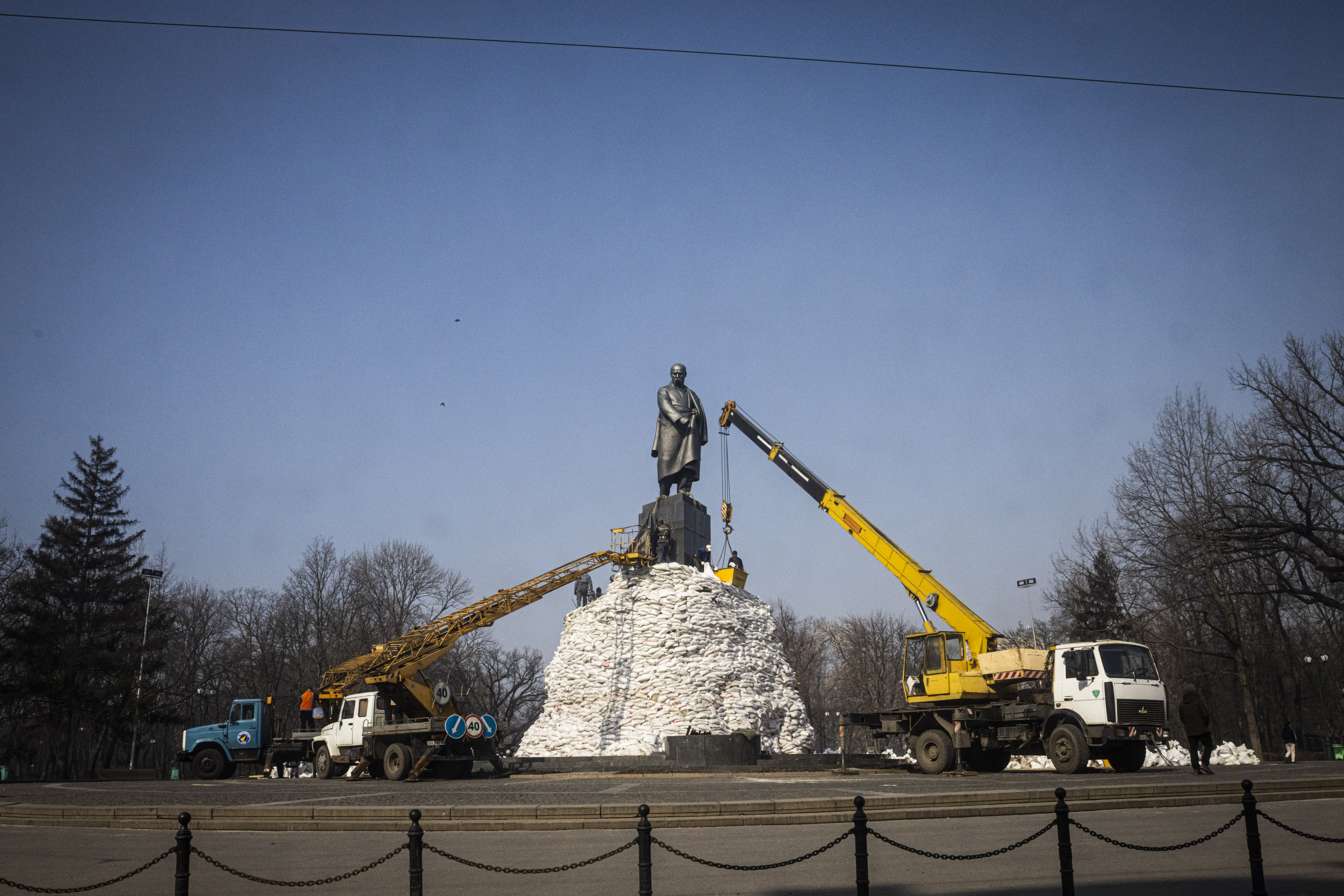 A statue of Taras Shevchenko is surrounded by sandbags in central Kharkiv
