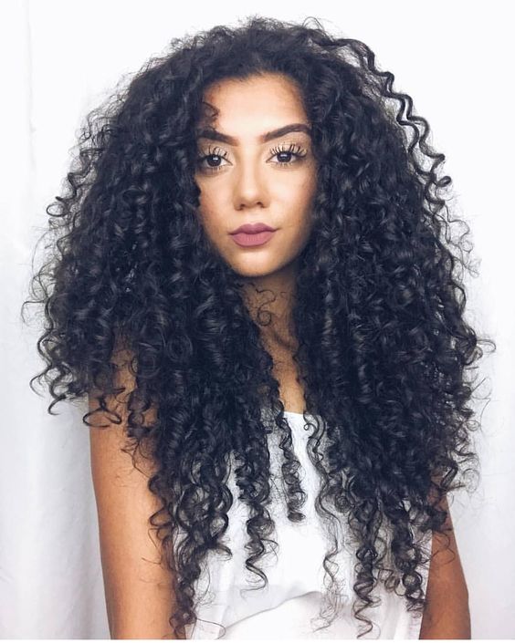Check Out These Tips To Grow Curls Faster