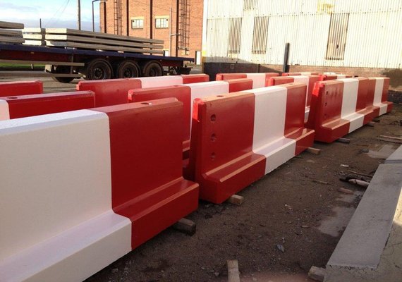 Jersey concrete barrier painted red and white