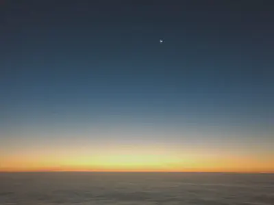 The sunset and moon both in the same shot.