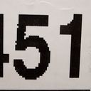 Fifty one printed as digits in black on white with oversized pixels.