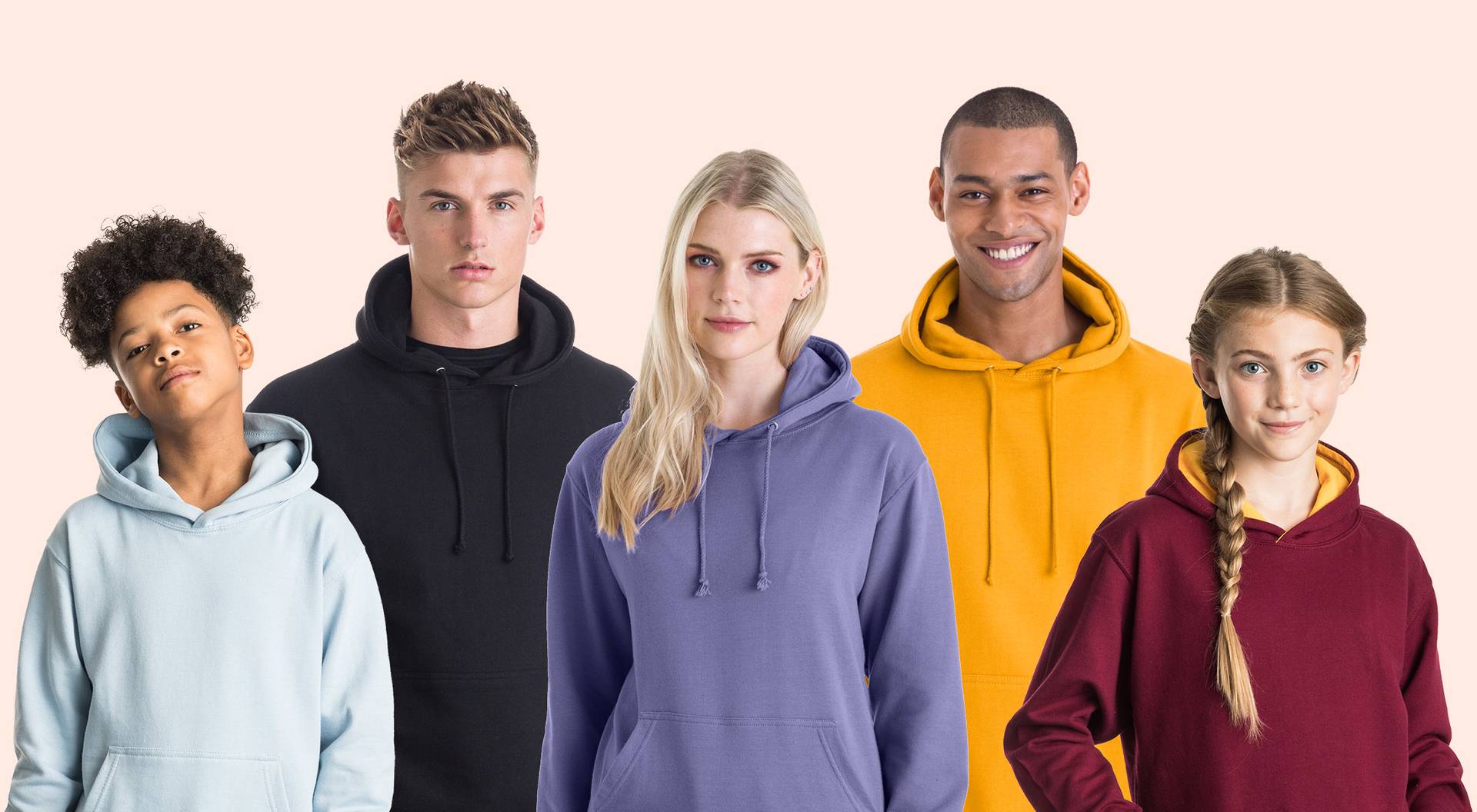 A group of people facing the camera all wearing the same style of hoodie but in various colours