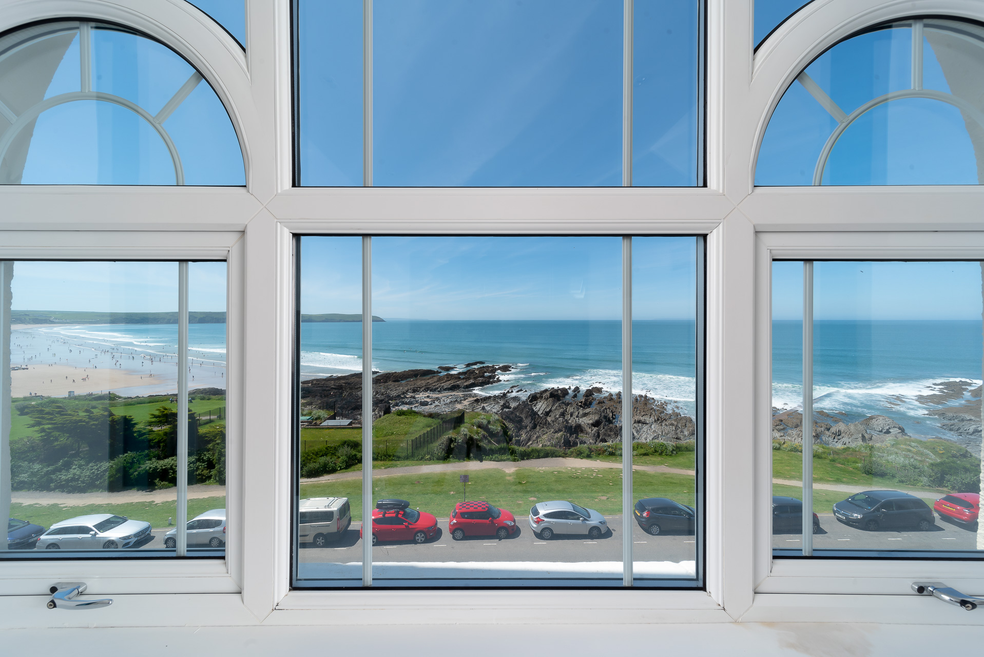 View overlooking Woolacombe Beach through the unique window at Woolacombe Penthouse
