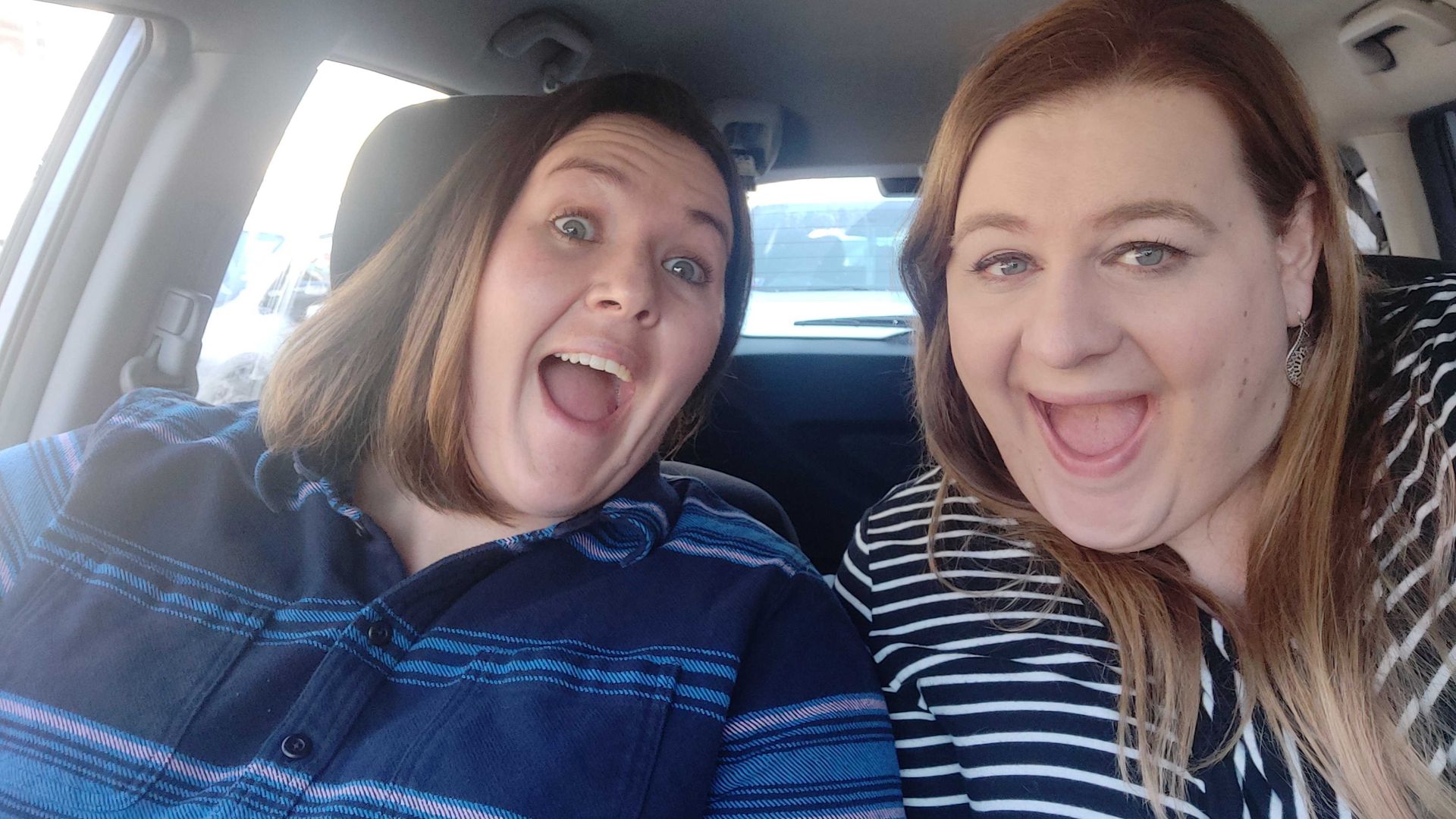 My 
    friend Tracey and I taking a silly picture in my car after we both were fully vaccinated.