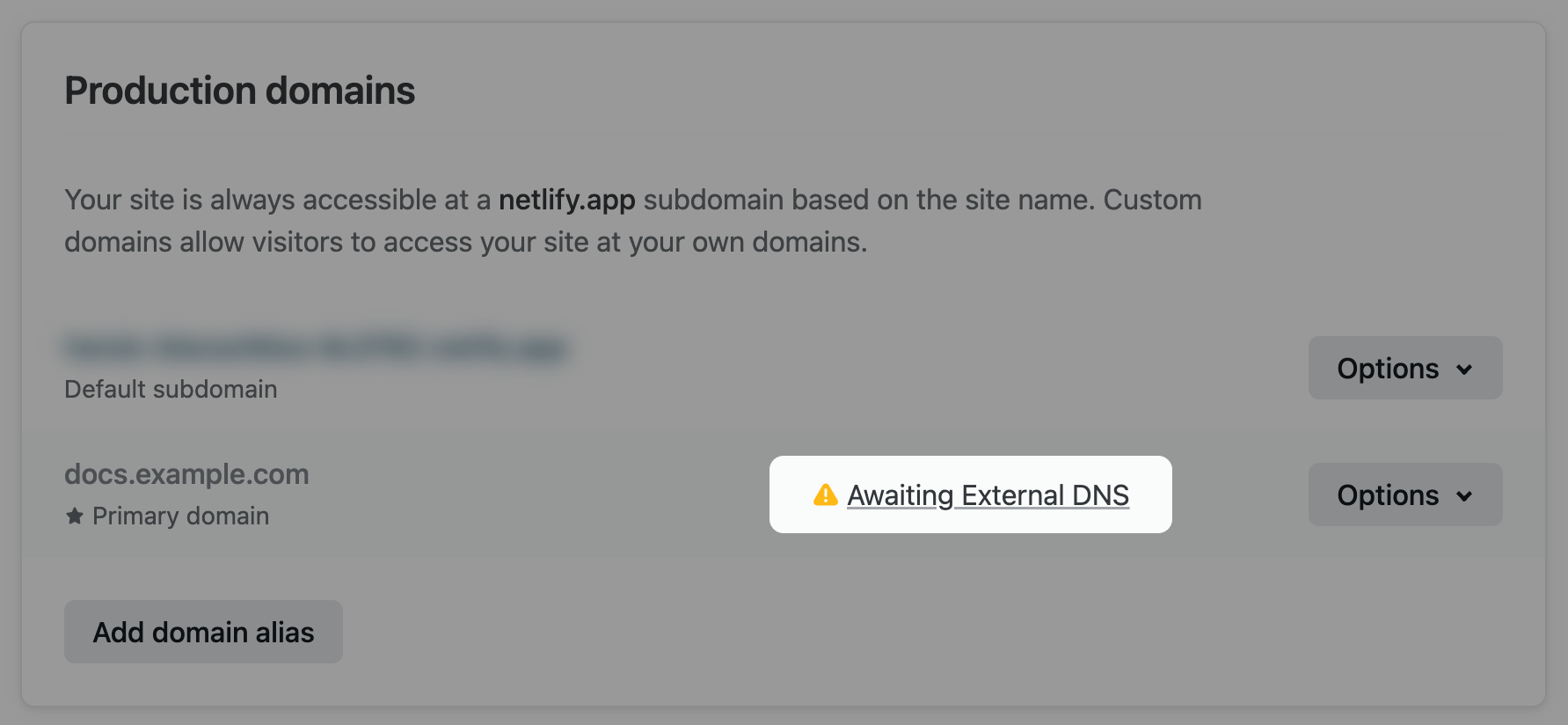 The link is between the domain name and the options menu.