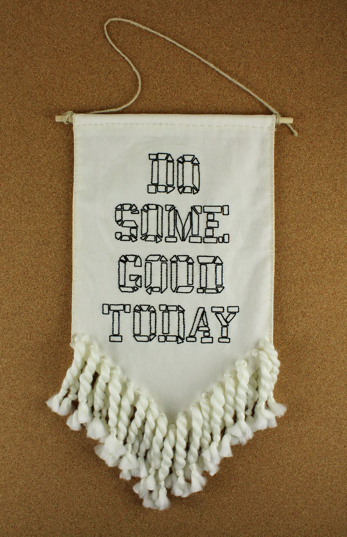 embroidered banner that says Do Some Good Today