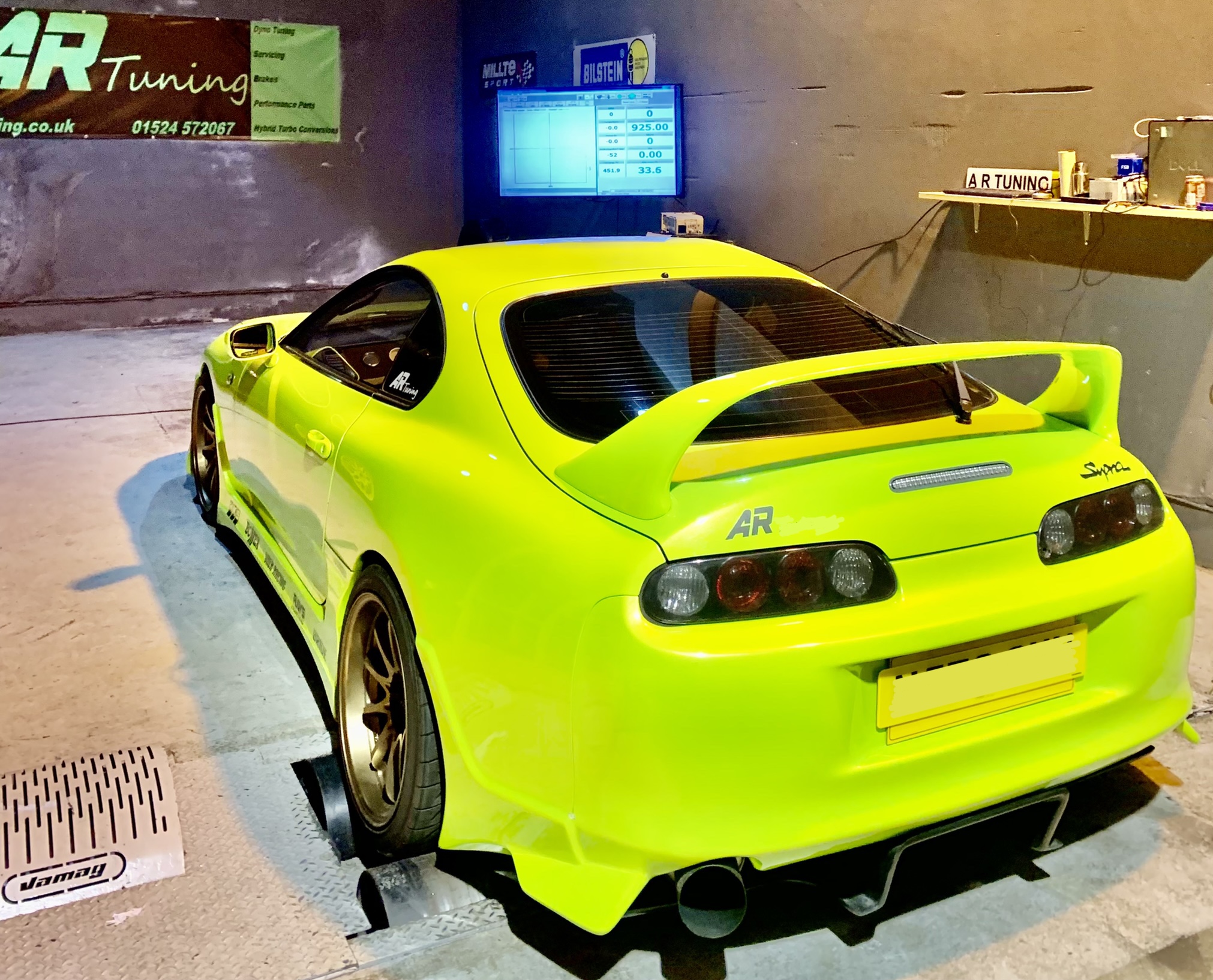 toyota supra on a rolling road dyno