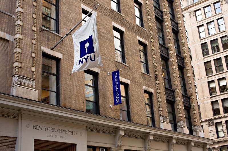 Flags hanging outside of NYU's East building
