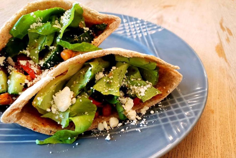 Plate with pita stuffed with chickpeas and Mediterranean vegetables