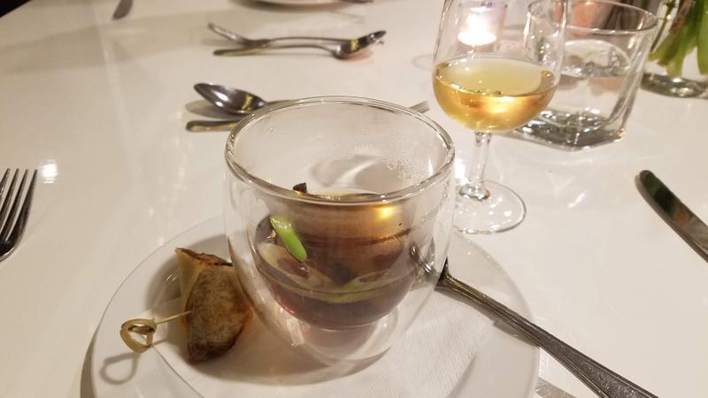 Duck consomme served with white port