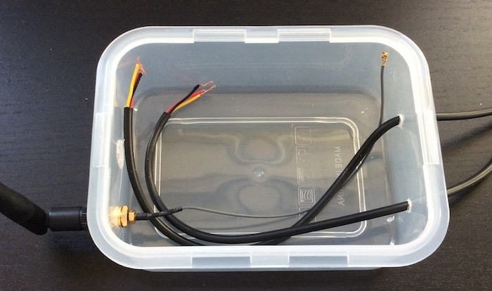 Enclosure of the Sous Vide Monitor. On the left is the external WiFi antenna. On the right are the wires of the two temperature sensors.