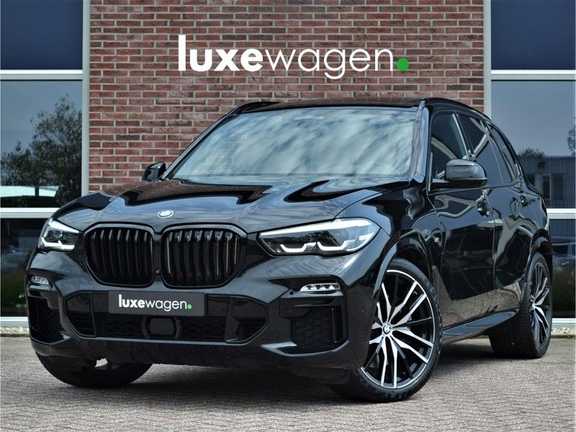 BMW X5 M50d 400pk Skylounge Luchtv DA+ PA+ Trekh NL-auto 22" Comfortzetels