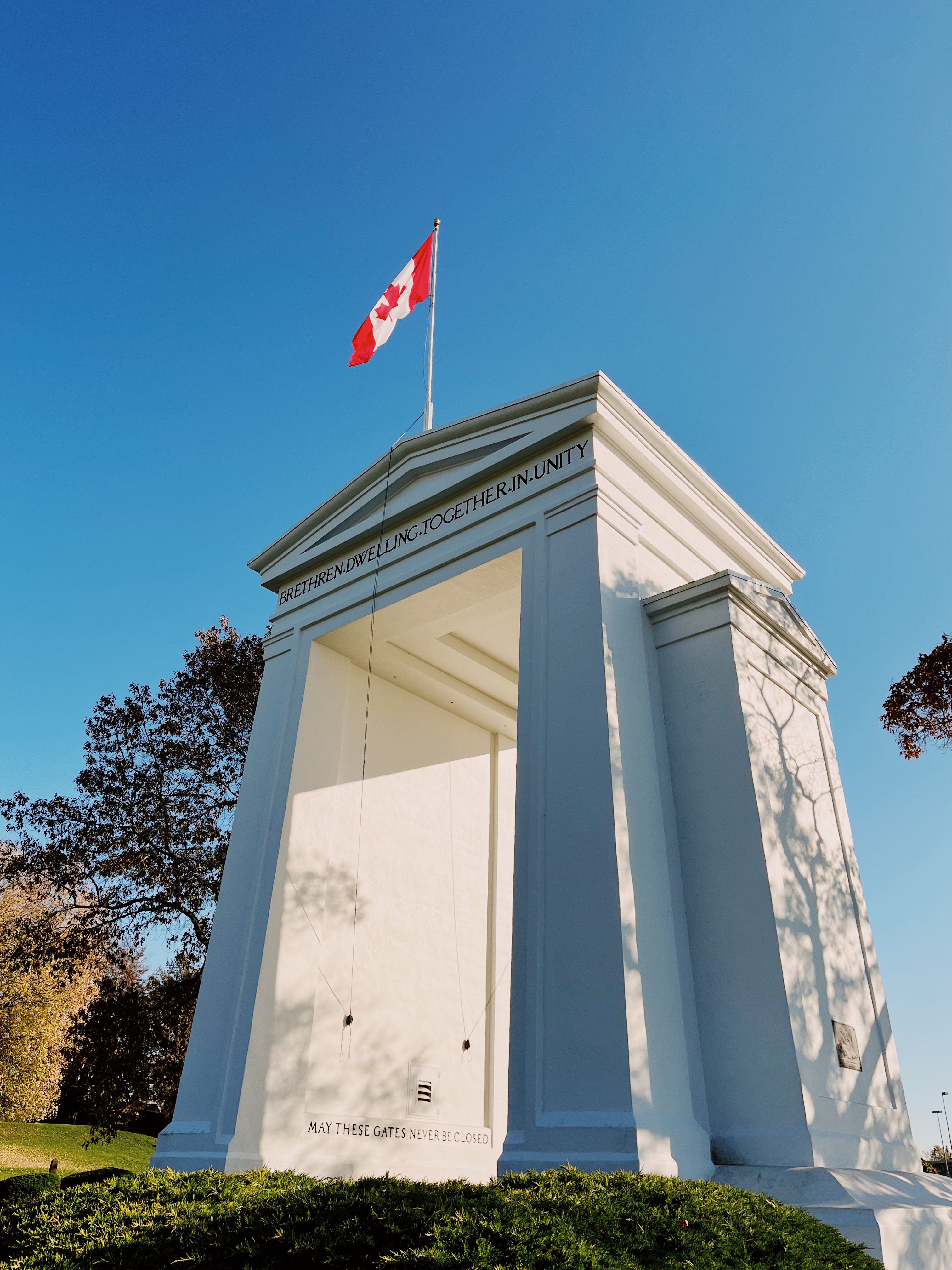 The Peace Arch at the US-Canada border, with the Canadian flag mounted above.