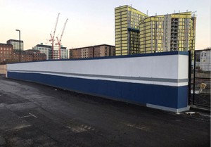blue timber hoarding in Manchester