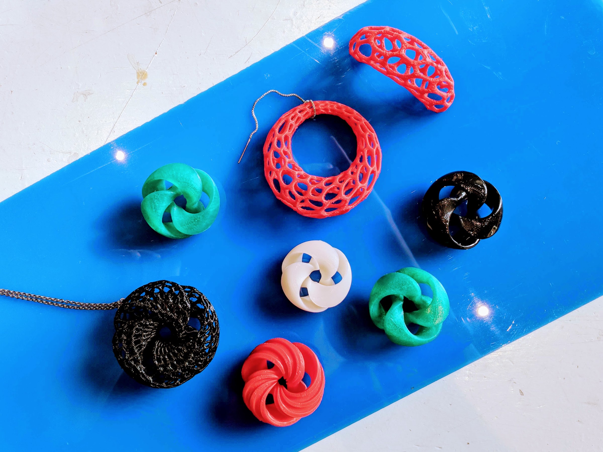 A jewelry collection of 3D printed pieces, based on mathematical surfaces