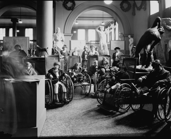 A group of students with disabilities visiting the Museum's Cast Collection galleries, Wing B, Gallery 40. Photographed November 23, 1922 © The Metropolitan Museum of Art